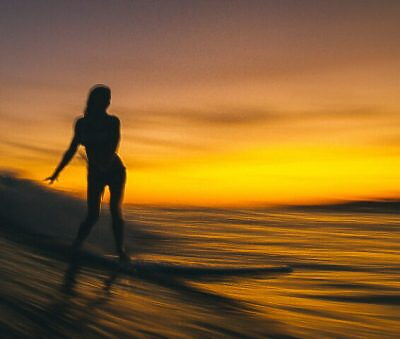 Surfer at Lawai Beach